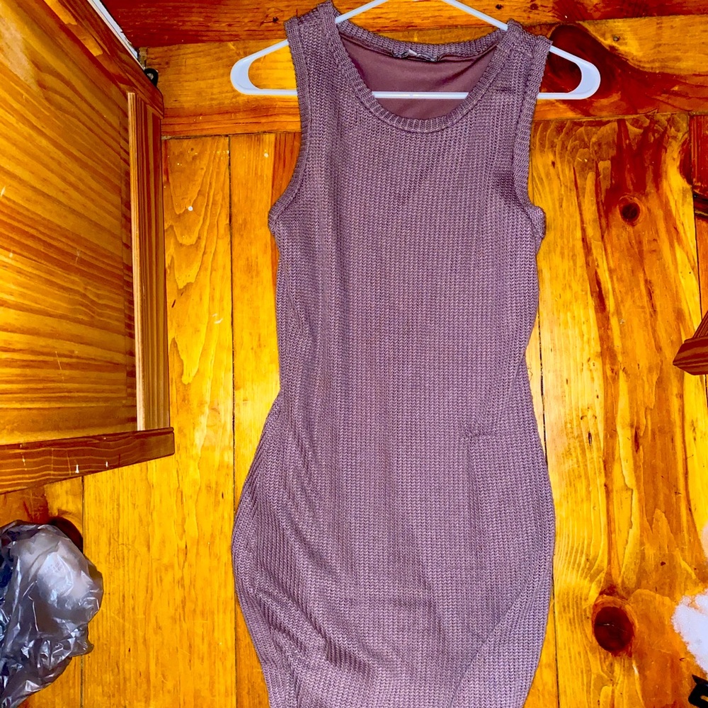 Charlotte Rues sweater dress.